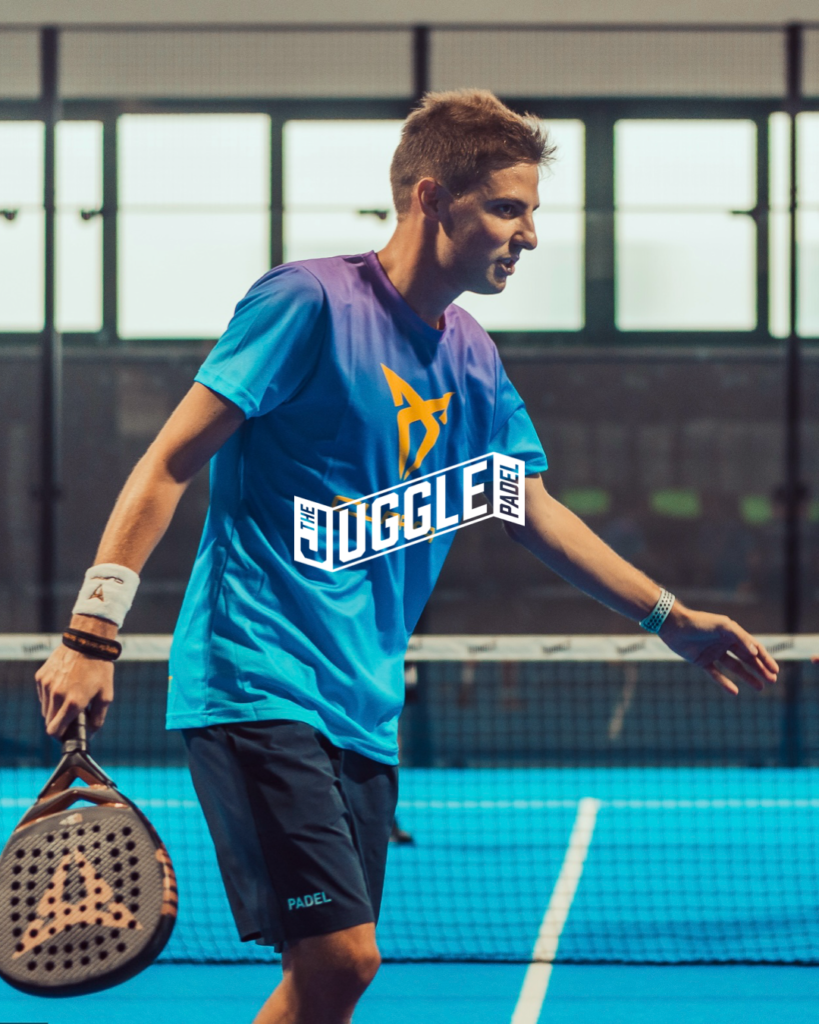 a man holding a tennis racket